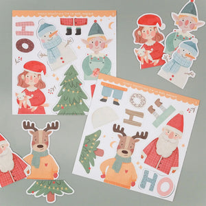 Magnetisk julepuslespil fra Ferflex med julefigurer, juletræ og Ho Ho Ho-magneter